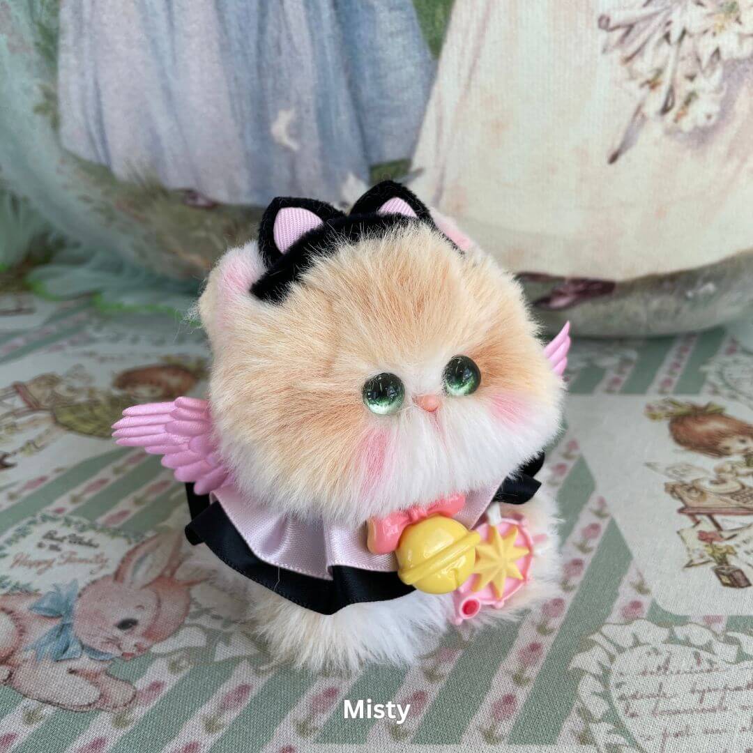 Handmade cosplay kitten plush with pink wings and magic wand from the Cosplay Kitten Collection. Styled for adventure and fantasy.