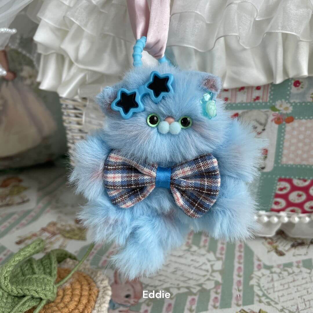 Handmade blue kitten pendant with plaid bow, star sunglasses, and hanging loop, perfect as a keychain or bag charm.