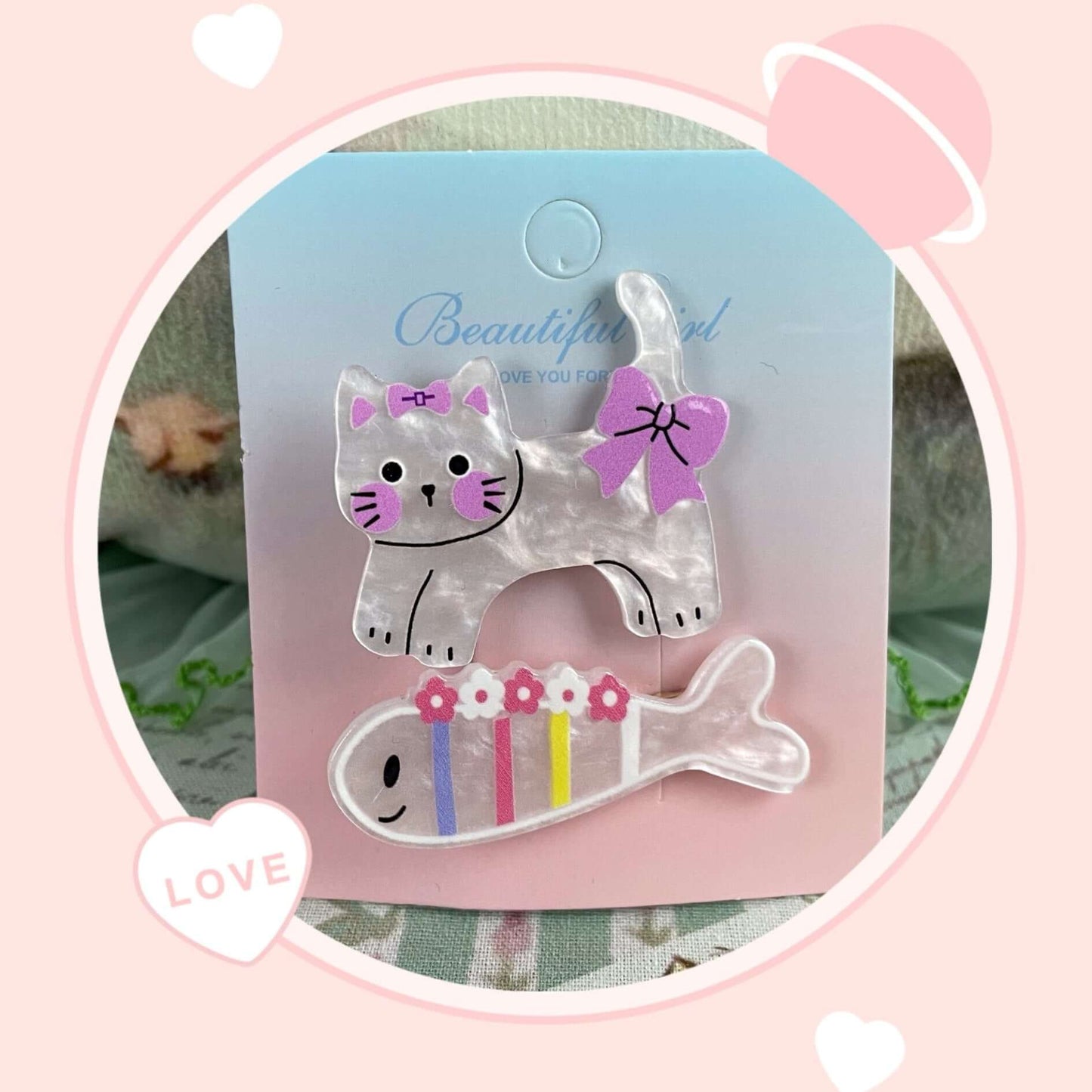 Adorable cat and fish clips for hair or bags, featuring cute designs perfect for accessorizing. Not handmade. Versatile use.