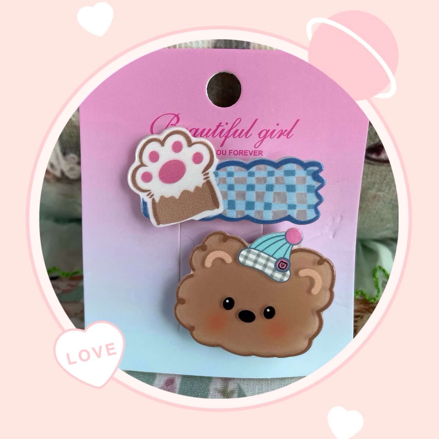 Cute animal-themed hair clips with plush puppy and kitten designs, perfect for adding a fun touch to bags or outfits.