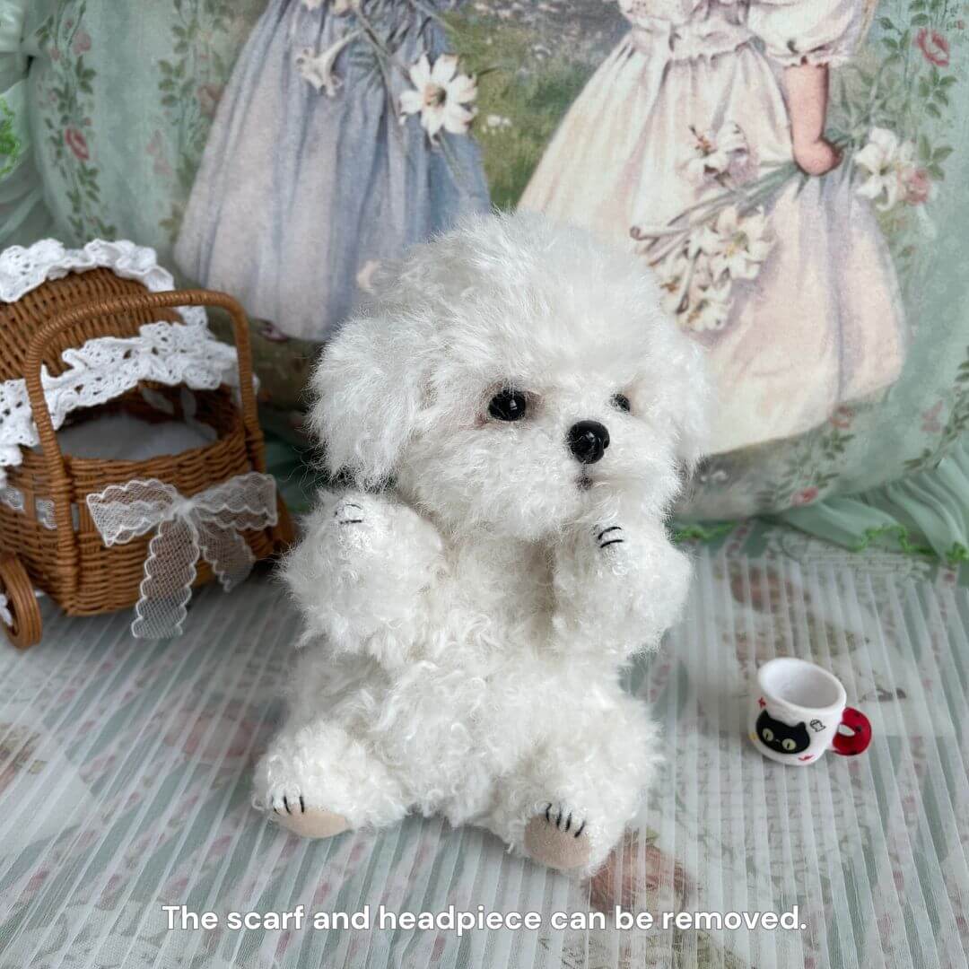 Cuddly Curly Teddy Dog with fluffy fur, movable joints, wearing hand-crocheted scarf and lace accessory, surrounded by cute decor.