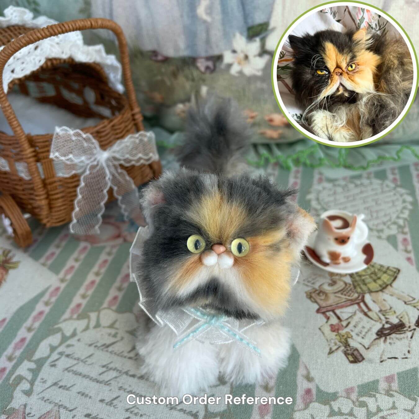 Custom handmade fluffy kitten plush toy on a vintage-style background with a tea set, featuring a comparison photo of a real cat.