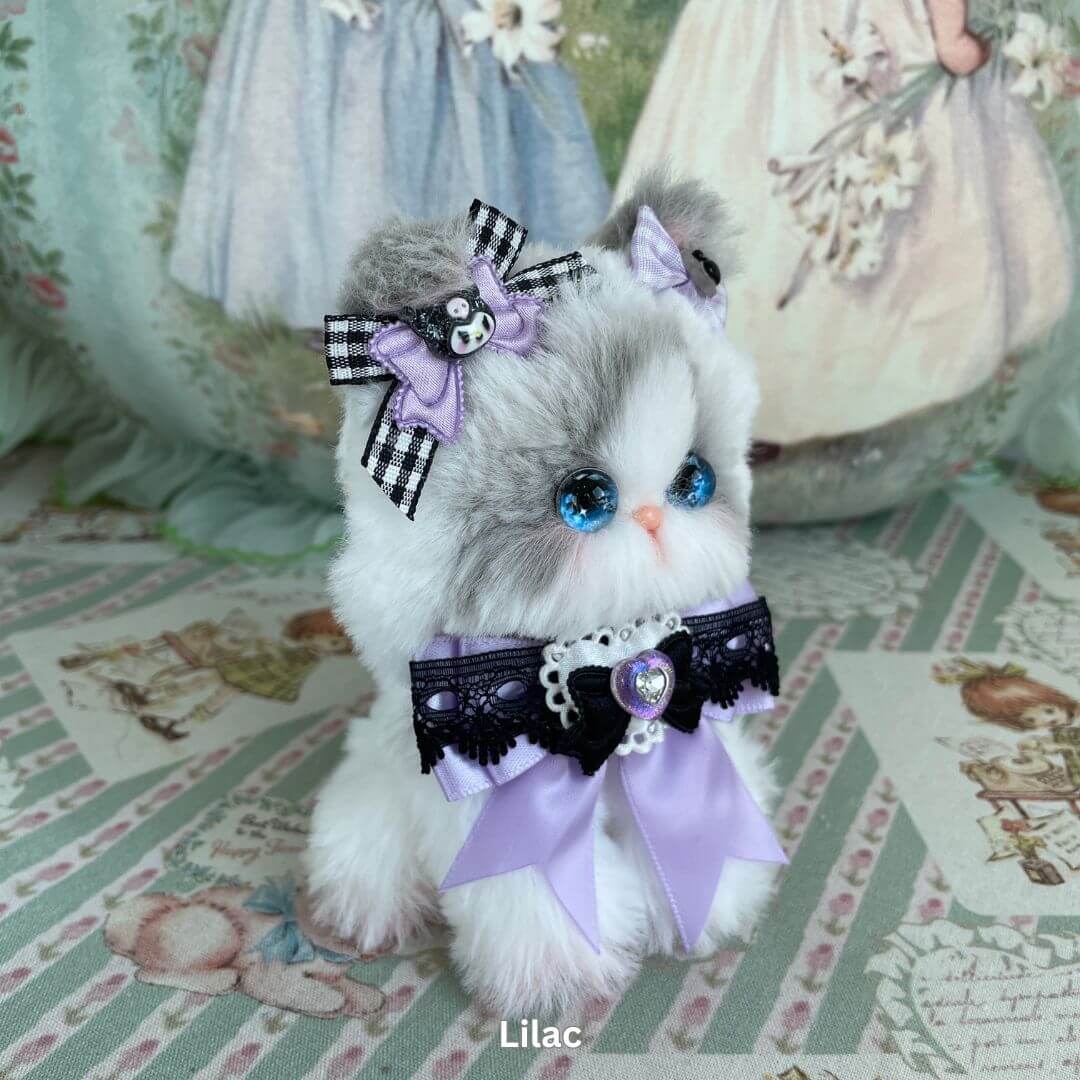 Handmade Enchanted Big Paws kitten plush with lilac bows, perfect for home or car decor and ideal gift for cat lovers.