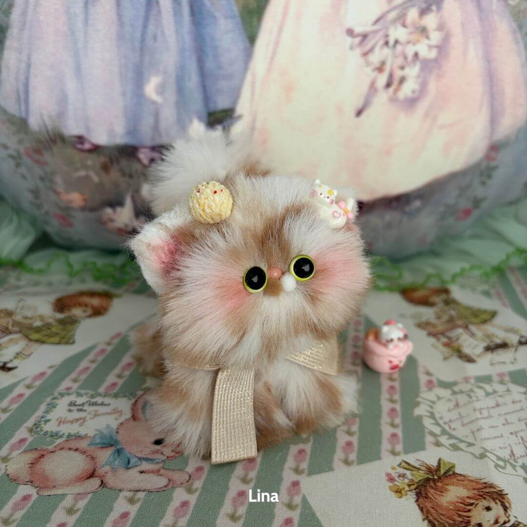 Fluffy Kitten Collection: cute fluffy kitten figurine in pastel colors with bows and sweets, handmade in the UK.