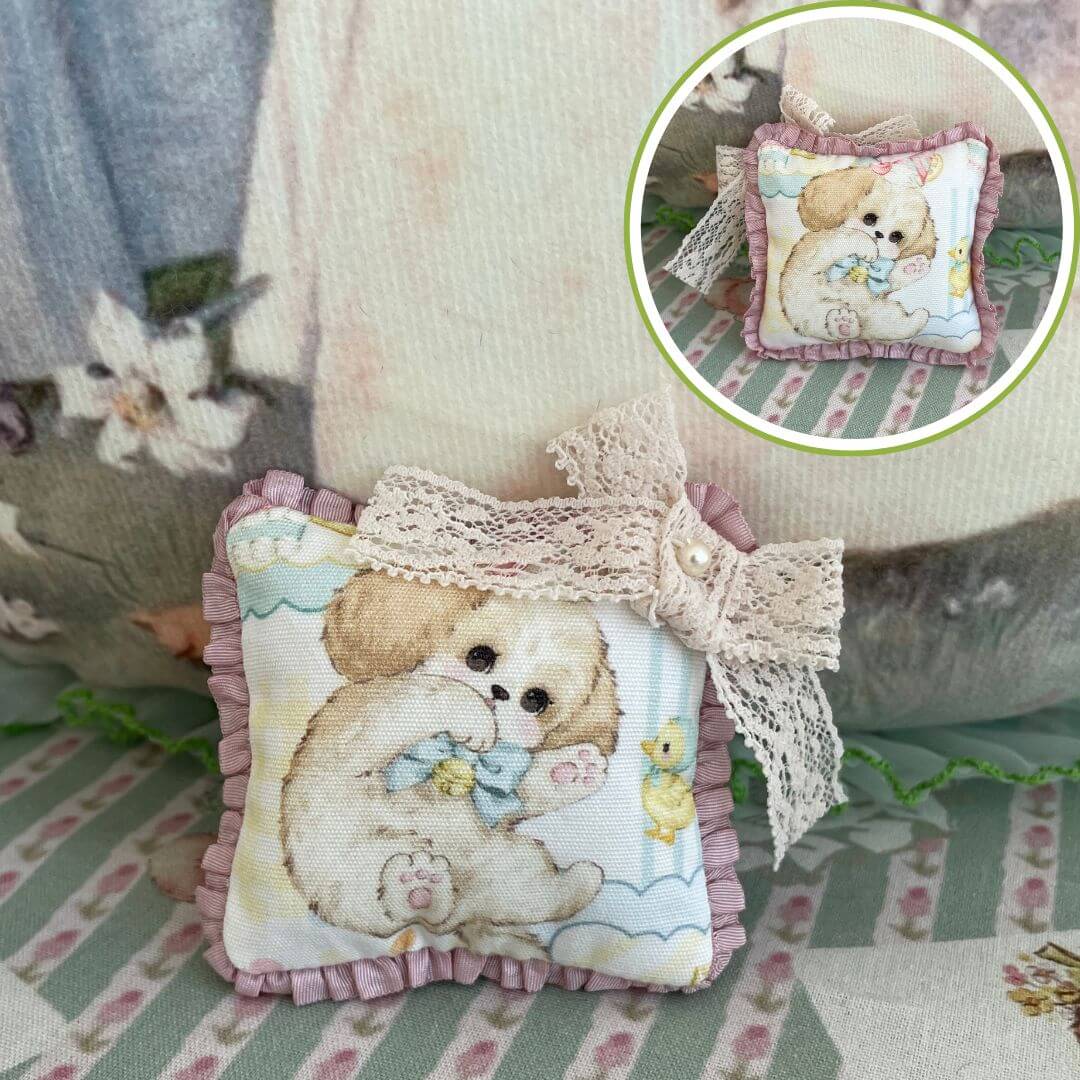 Handmade mini cuddle critter cushion with puppy design, lace bow detail, perfect as toy or decorative desk accessory, 7x7 cm.