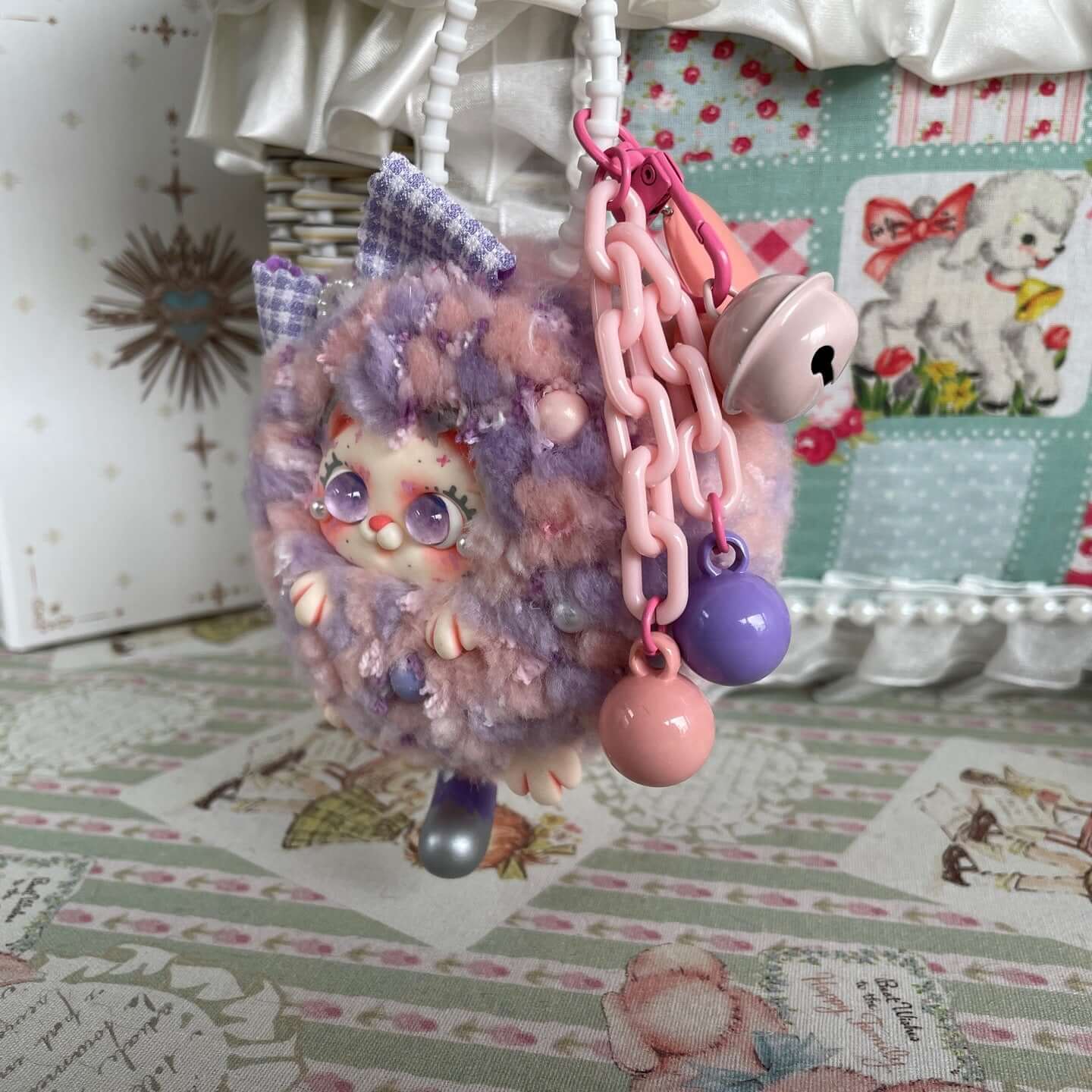 Handmade Fluffy Kitten Ball Bag Pendant, Limited Edition, with multi-coloured kitten design, pink and purple fluffy details. Size: 8.5 x 8.5 x 6 cm.