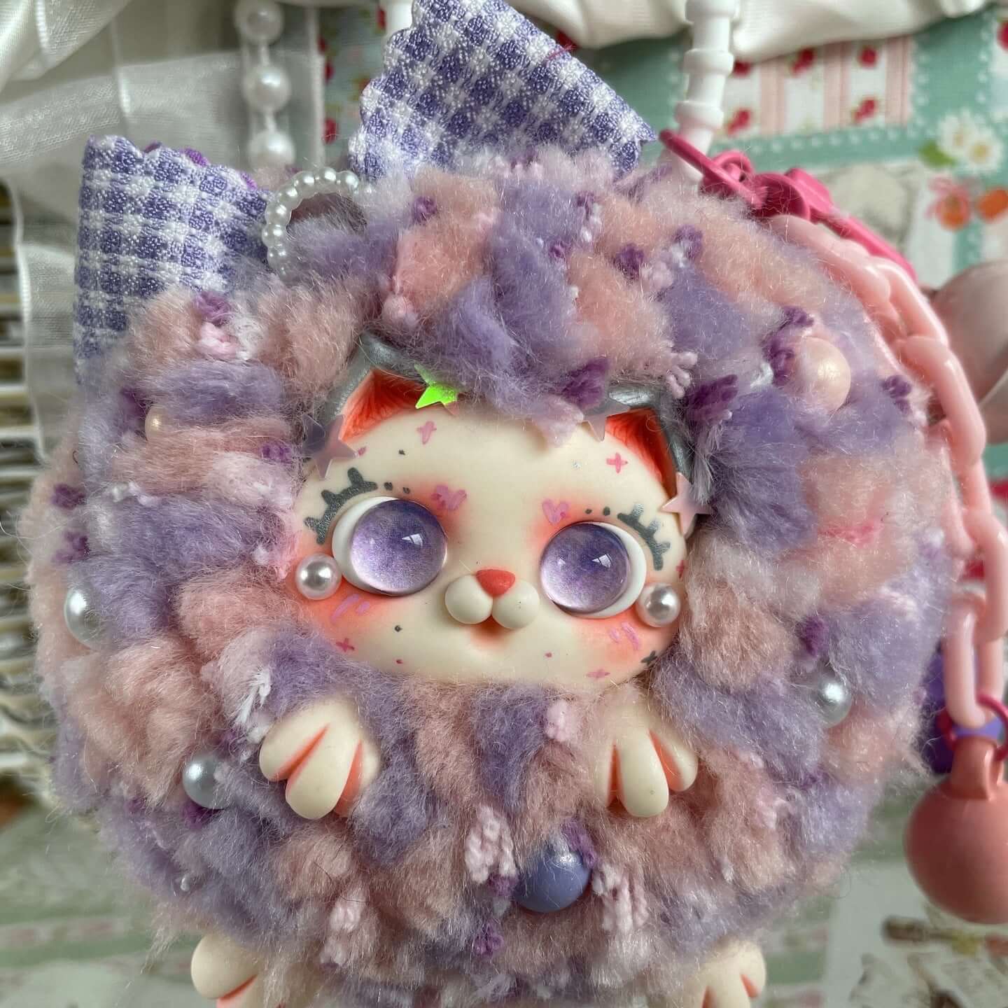 Limited edition handmade fluffy kitten ball pendant with multicolored design, perfect for adding whimsy to bags.