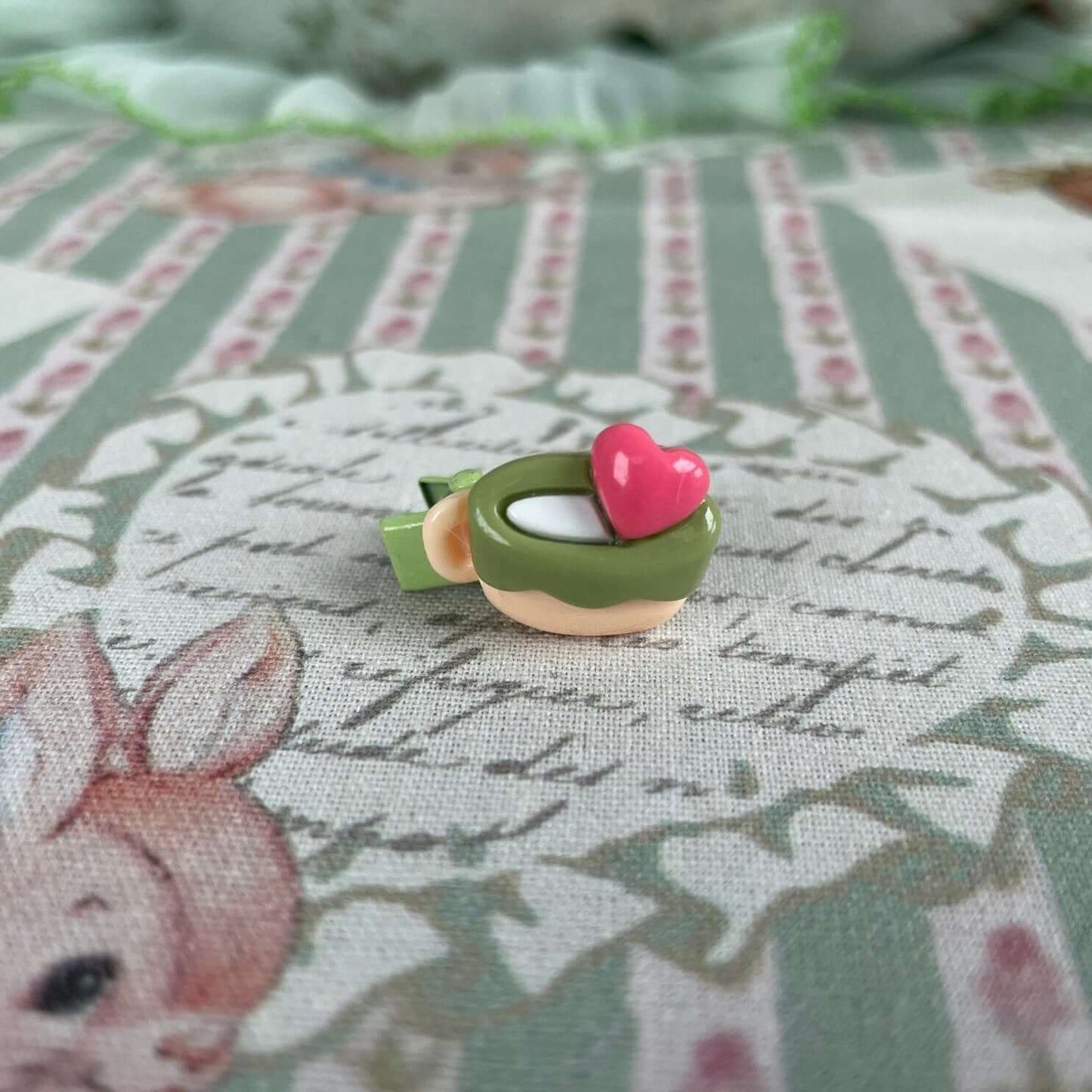 Handmade mini clip with heart design, perfect for decorating plush kittens and puppies or as a whimsical accessory.