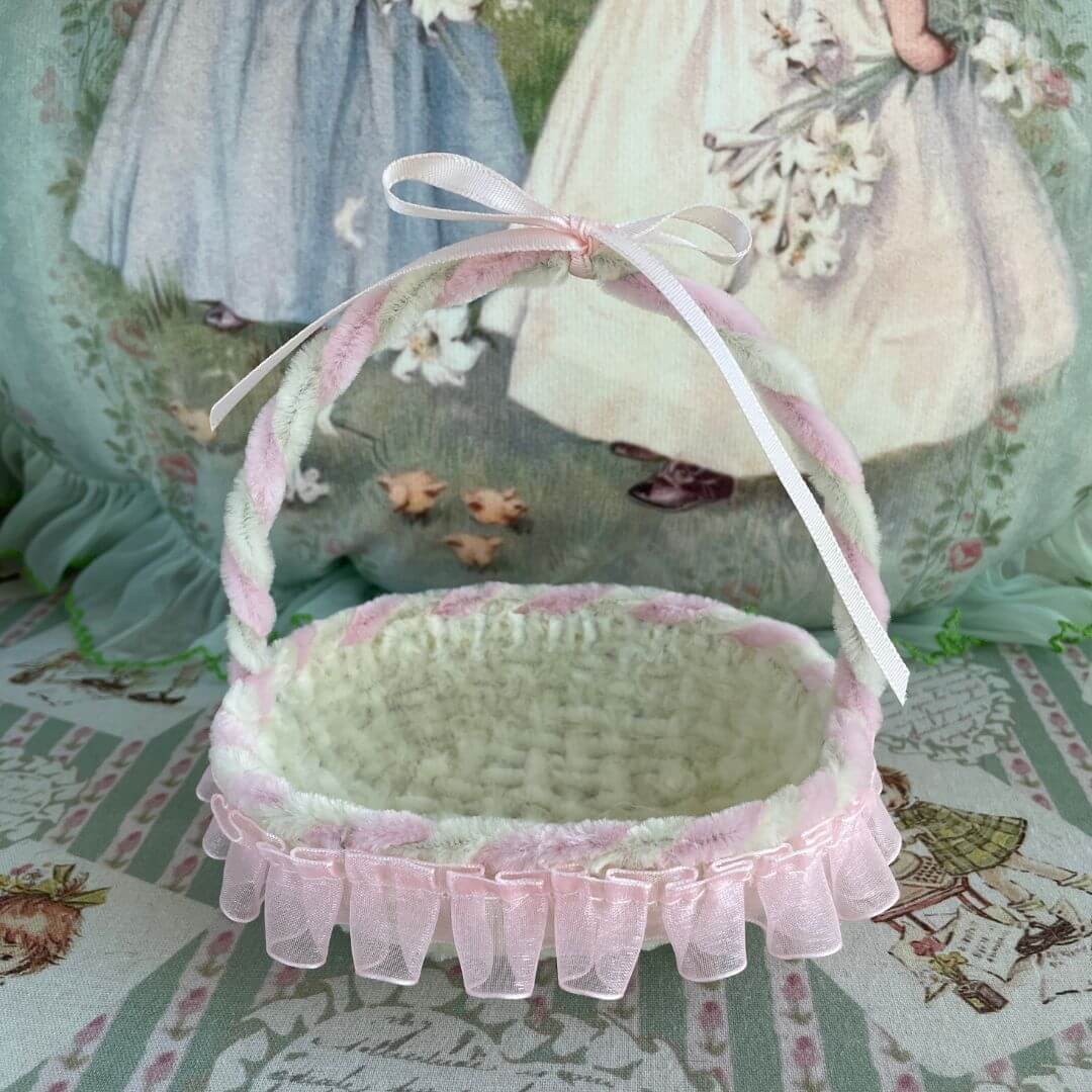 Handmade whimsical cradle with pink ribbon, perfect for displaying plush kittens, puppies, or as diorama accessories.