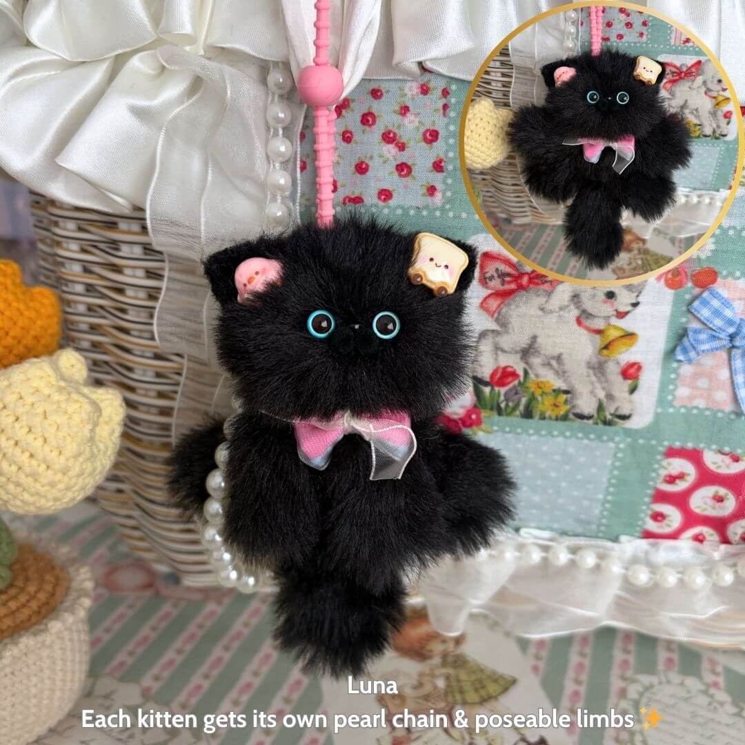 Adorable Kitten Pendants: fluffy black kitten keychain with pearl chain, pink bow, and poseable limbs, handmade in UK.