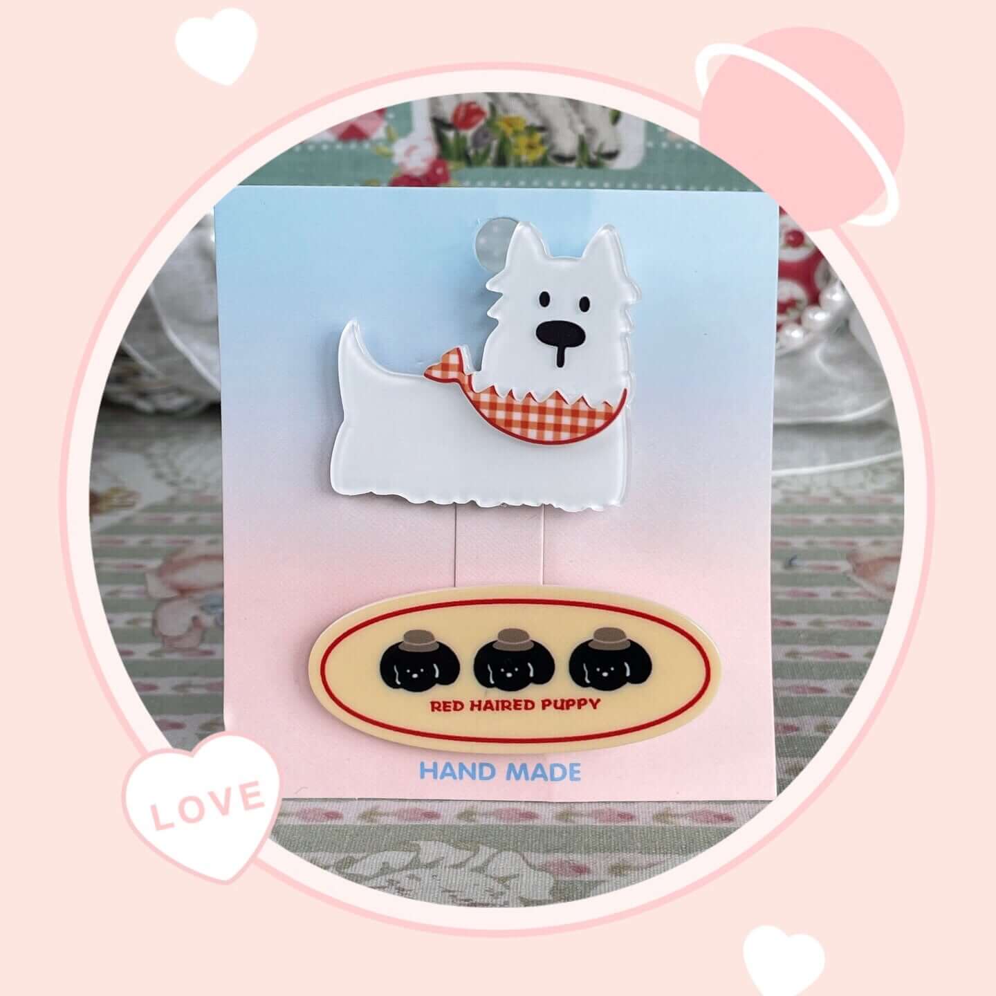 Adorable white dog clip with red scarf, perfect accessory for bags or clothes. Cute design, adds charm to any outfit. Handmade style.