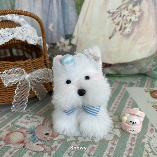 Handmade plush puppy toy named Snowy from Adorable Puppy Collection, featuring soft white faux fur and blue accessories.