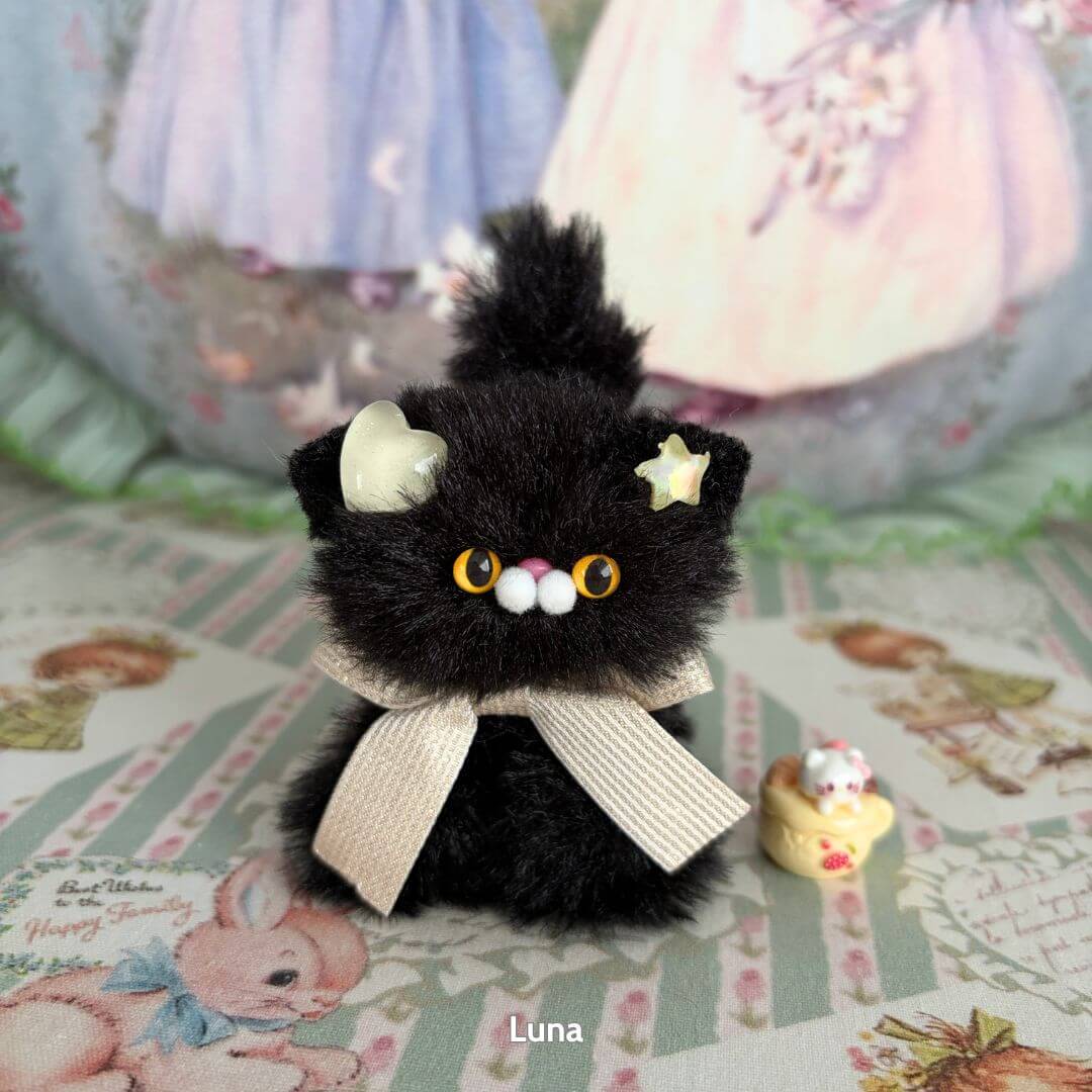 Glossy Meowgic Collection fluffy black handmade kitten figurine with cute accessories and detailed features.