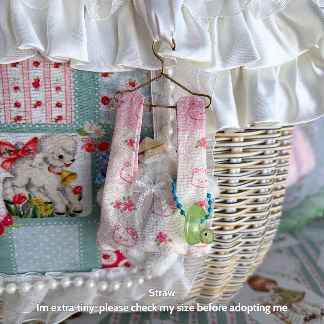 Little Hanger Pals handmade kitten hanging with soft pipe cleaners in pastel colors, cute accessories, and delicate details.