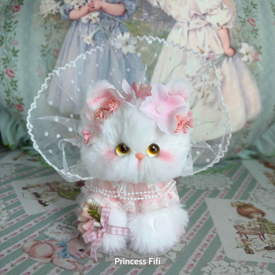 Enchanted Big Paws Collection fluffy kitten figurine adorned with flowers and lace, handmade fantasy kitten decor.