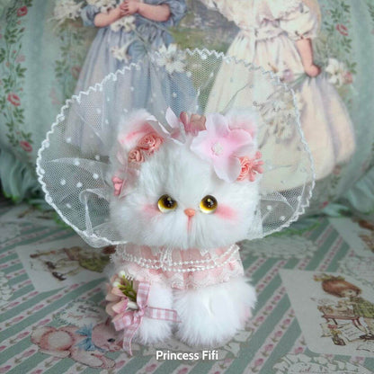 Enchanted Big Paws Collection fluffy kitten figurine adorned with flowers and lace, handmade fantasy kitten decor.