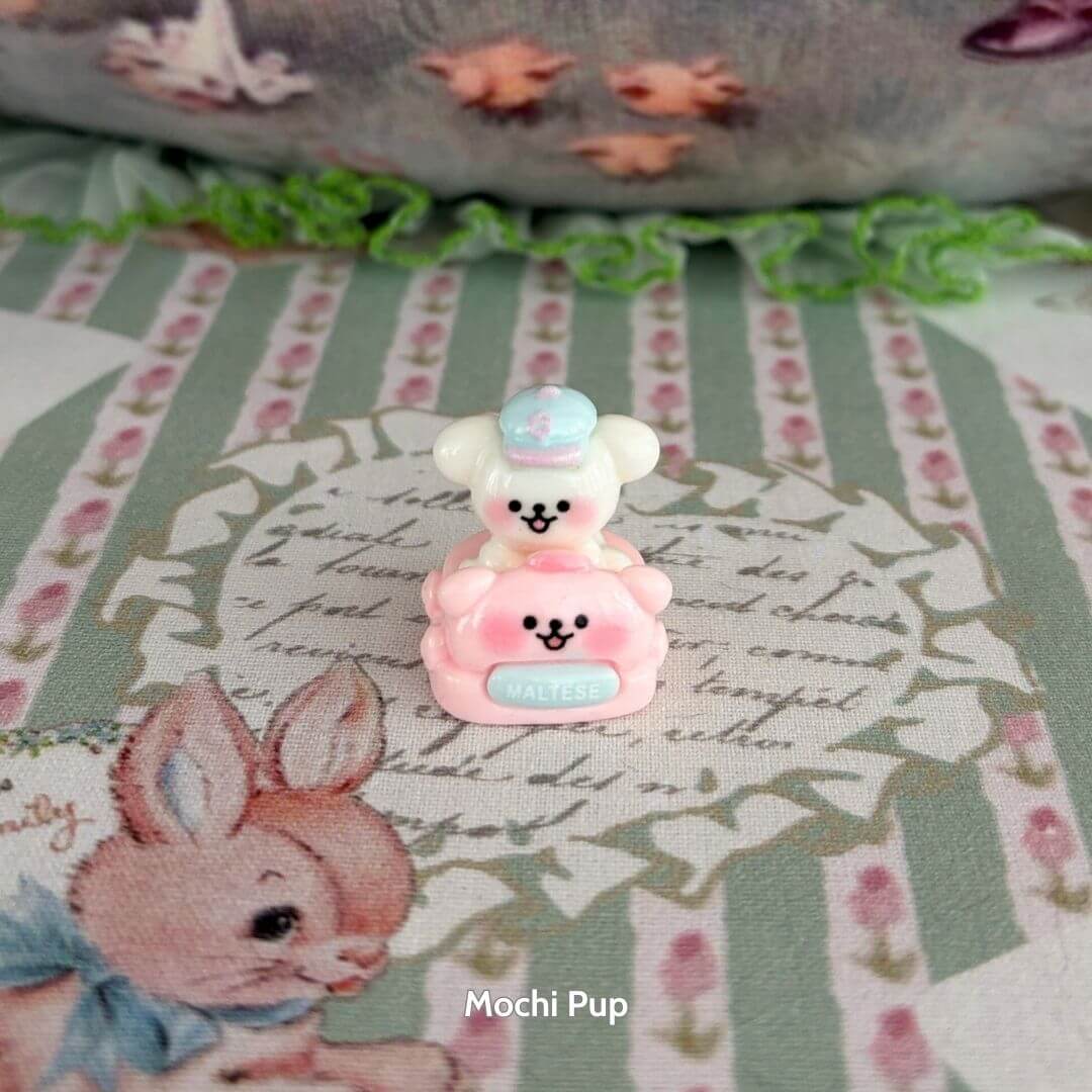 Puppy Car Mini Decor featuring cute fluffy puppies in pastel toy cars, charming and collectible mini decorations.