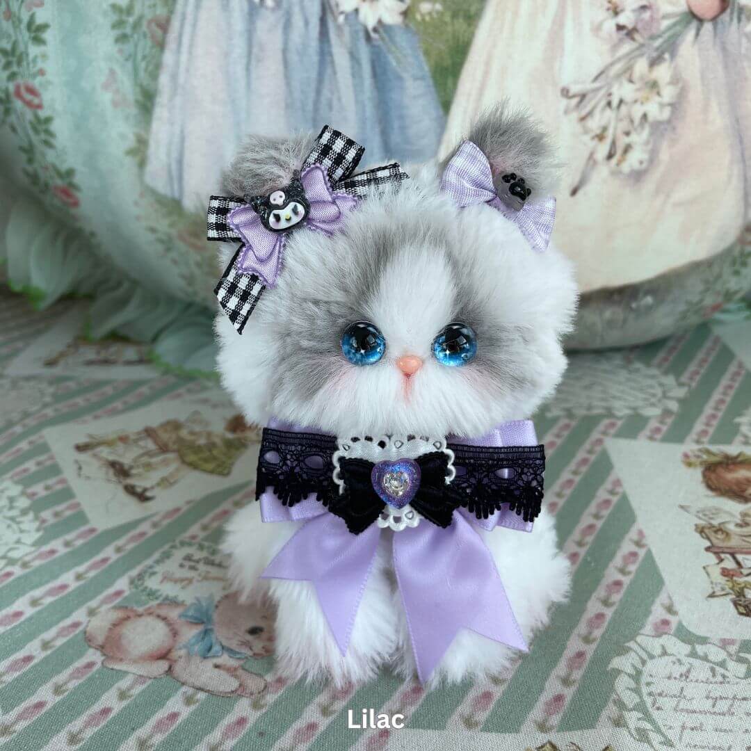 Handmade plush kitten toy with lilac and black ribbons from Enchanted Big Paws Collection by Aiko at Kiki's Handmade Studio.