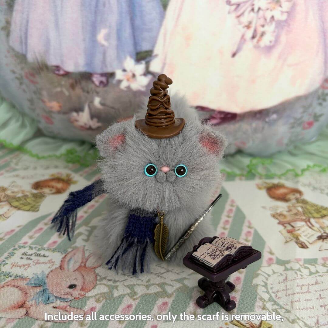 Handmade fluffy kitten with wizard hat and blue scarf, miniature cat figurine, part of Magic Kitty Companions collection.