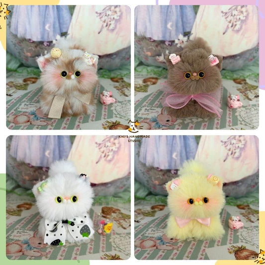Fluffy Kitten Collection featuring four handmade kittens in pastel hues, adorned with bows and accessories, cute collectible decor.