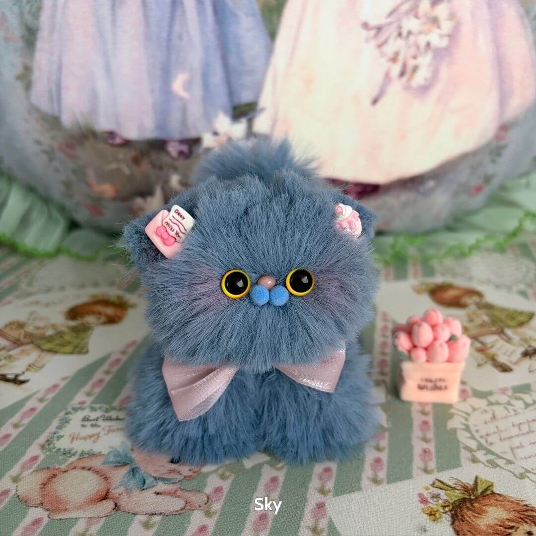 Fluffy Kitten Collection: Blue fluffy kitten figurine with bows and candy decor, cute kawaii style, handmade in UK.