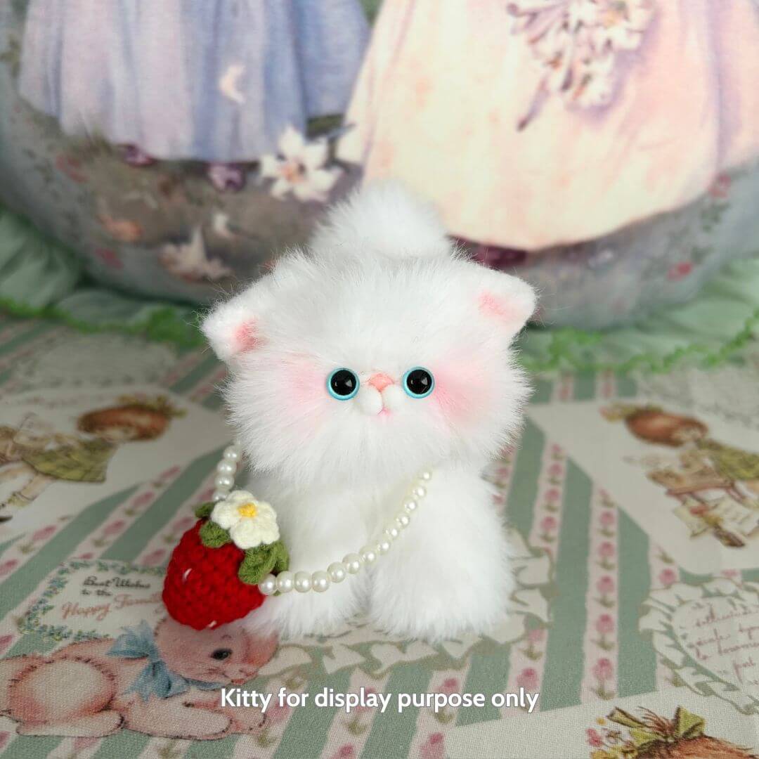 Snuggle Bits: Fluffy white miniature kitten with blue eyes wearing a pearl necklace and holding a strawberry purse, cute collectible.