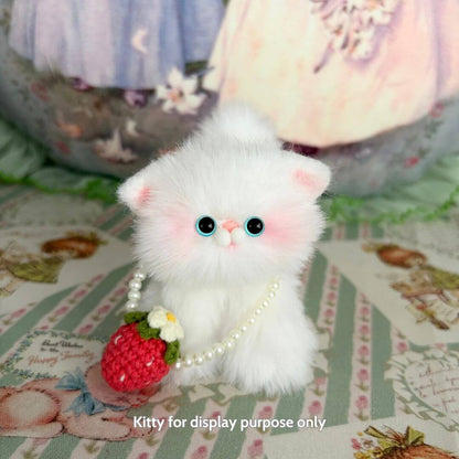 Adorable fluffy white kitten figurine with a sweet strawberry purse and pearl necklace, part of Snuggle Bits handmade collection.