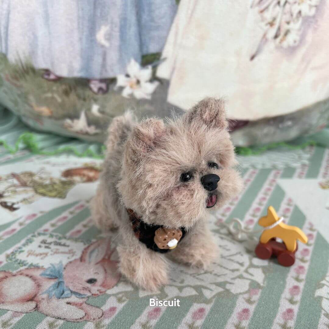 Handmade fluffy puppy from the Fluffy Puppy Collection, light brown fur, sitting pose, cute collar with a charm, playful theme.