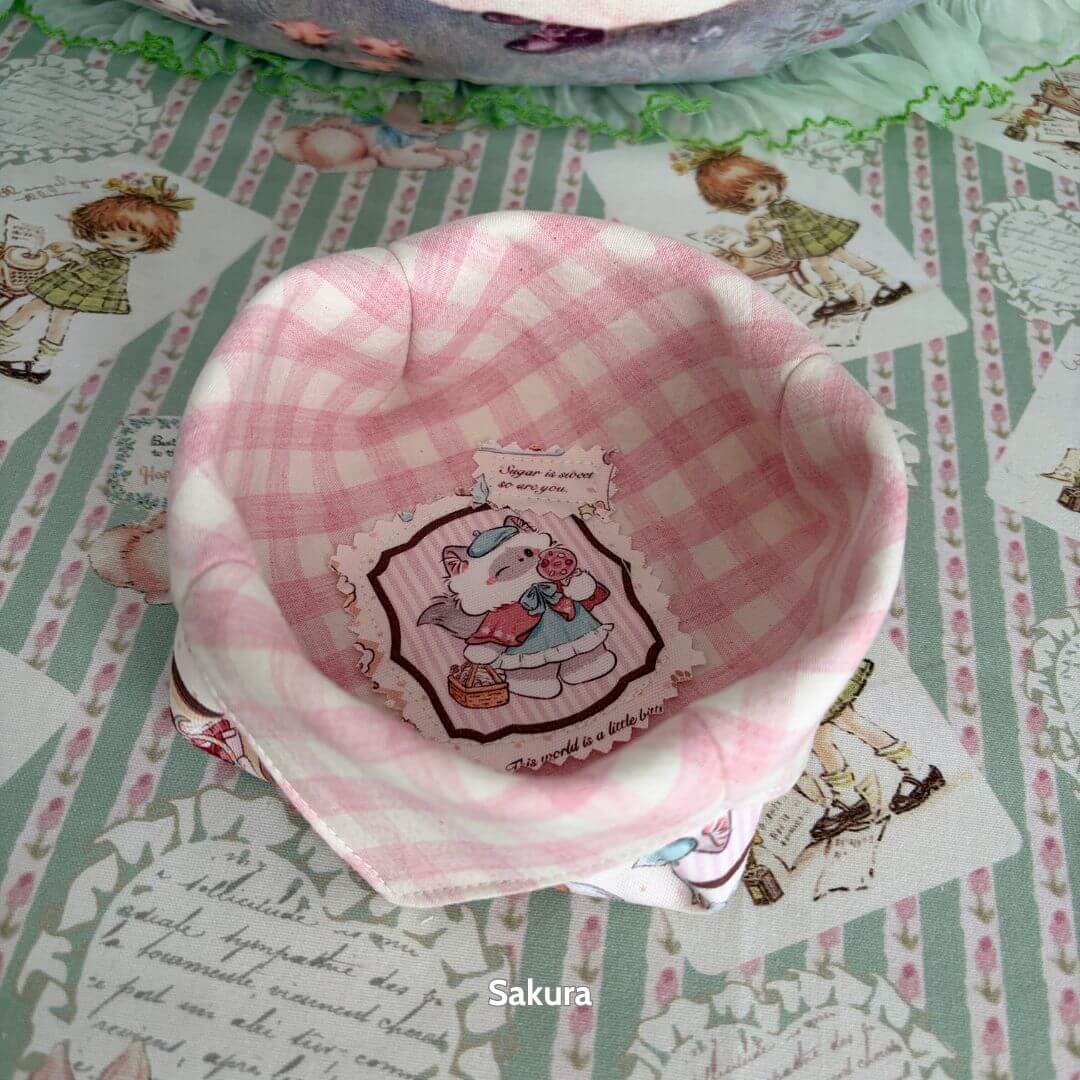 Gingham Cat Catch-All Tray in pink pastel gingham with a cute kitten design, ideal for organizing small items.
