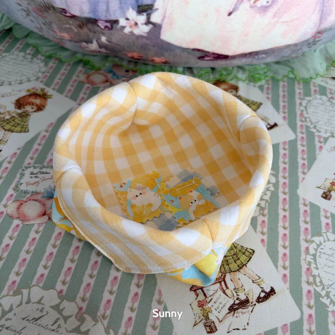 Gingham Cat Catch-All Tray in pastel yellow and white checkered pattern, perfect for holding small items, cute and practical decor.