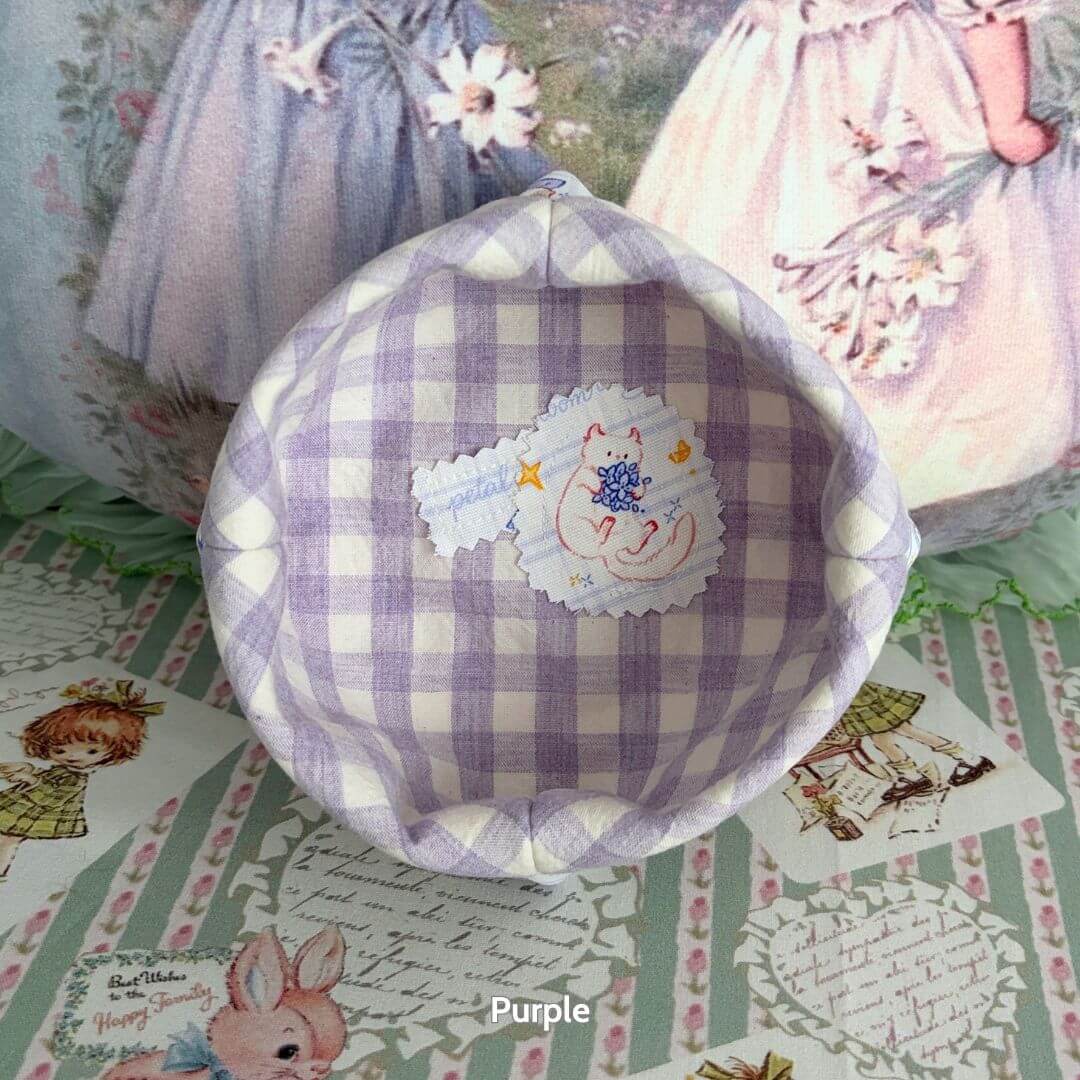 Gingham Cat Catch-All Tray in pastel purple, featuring a stitched kitten motif, perfect for organizing small items.