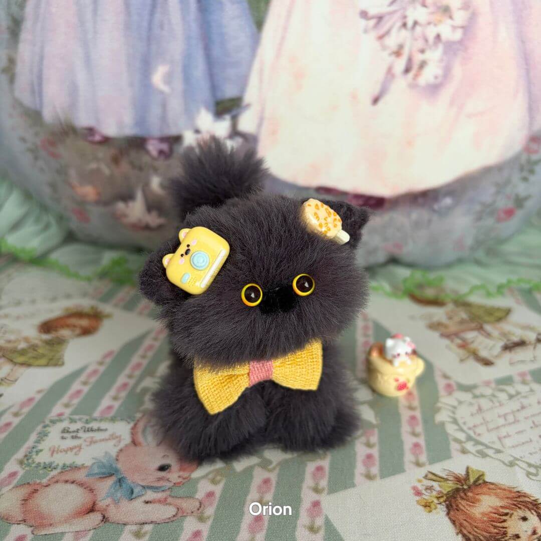 Grey Kitten Collection: Fluffy black kitten figurine with yellow bow, cute accessories, and miniature decor, handmade in the UK.