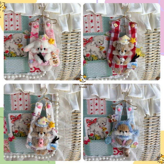 Four Little Hanger Pals featuring handmade kittens in pastel colors, each hanging from mini hangers with playful accessories and details.