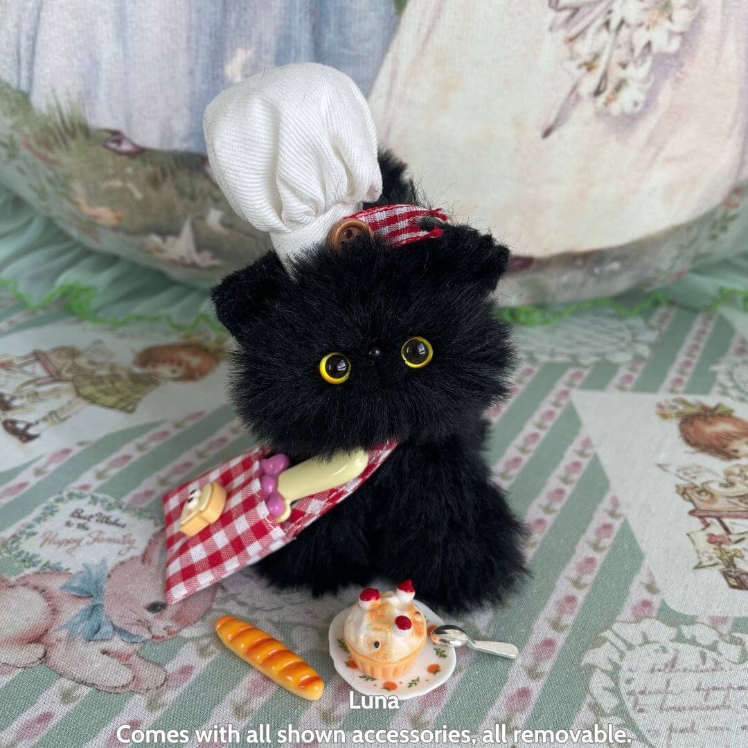 Purrfect Chef Kitten Sets featuring a fluffy black kitten in a chef hat, with miniature cooking tools and treats.