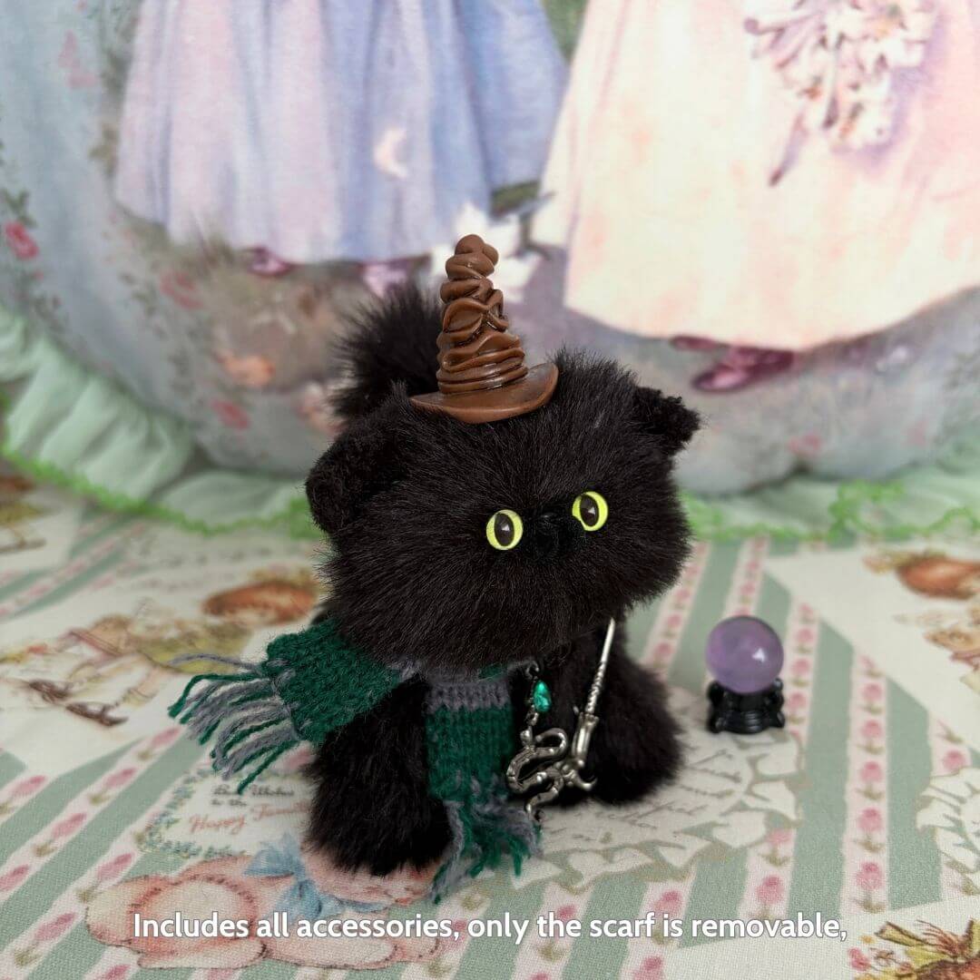 Magic Kitty Companions black fluffy kitten figurine with wizard hat, green scarf, and magical accessories, handmade in UK.