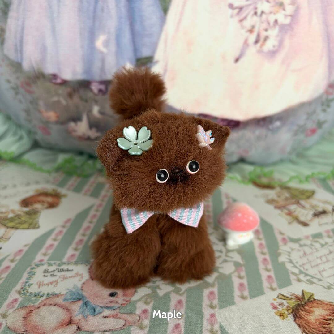 Alt Tag: Brown Kitten Collection adorable fluffy kitten figurine with pastel accessories, styled in a kawaii theme, handmade in UK.