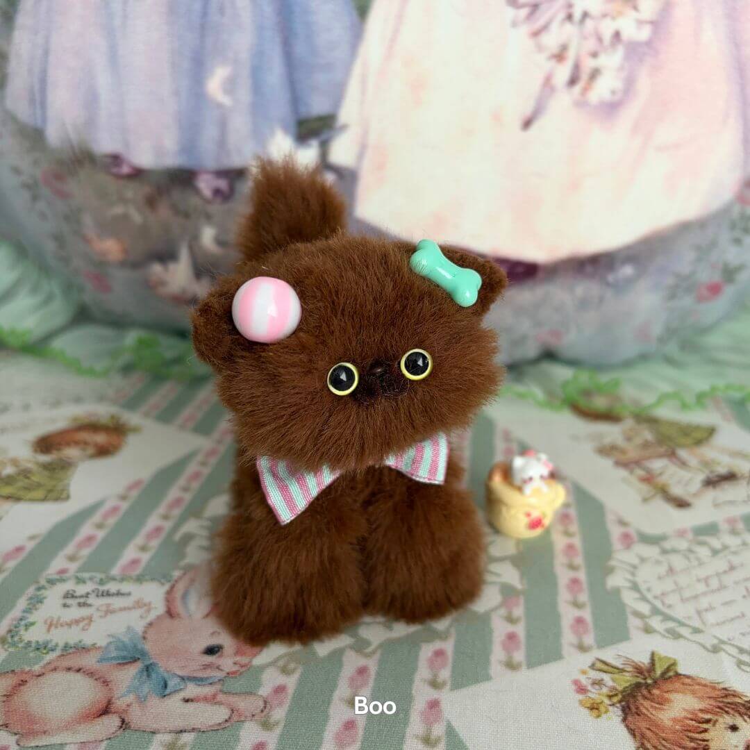 Handmade Brown Kitten Collection mini cat figurine with fluffy fur, cute dessert-themed accessories and a playful expression.