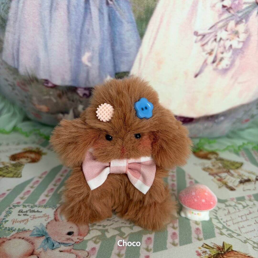 Adorable Bunny Collection featuring a fluffy brown bunny with a pink bow and cute accessories, set against whimsical decor.