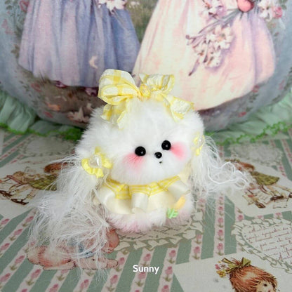 Cute handmade puppy from the Cosplay Puppy Collection, fluffy white with a yellow bow and dress, perfect for collectors.