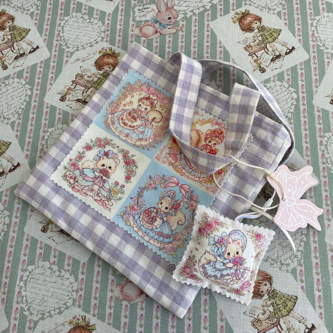 Handmade Dreamy Tote Bag with double-sided cat and squirrel design on a fairy-tale pattern background, perfect for everyday essentials.