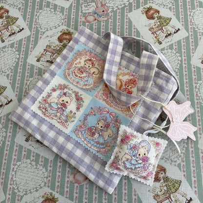 Handmade Dreamy Tote Bag with double-sided cat and squirrel design on a fairy-tale pattern background, perfect for everyday essentials.