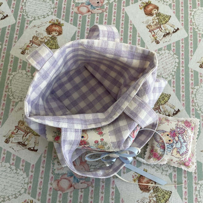Interior of Handmade Dreamy Tote Bag with plaid lining and whimsical cat and squirrel pattern, ideal for carrying essentials.