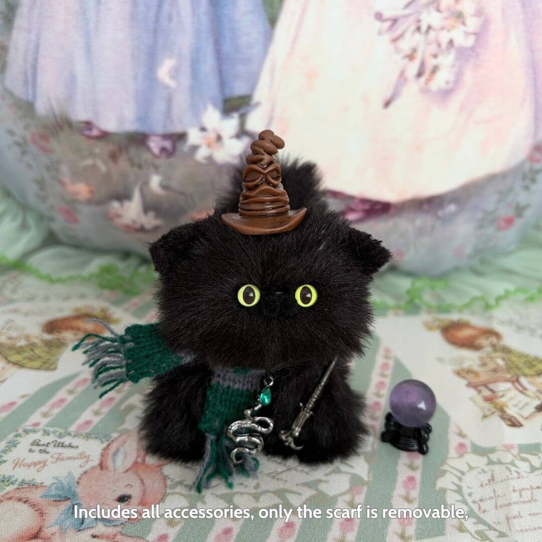 Handmade fluffy Magic Kitty Companion wearing a wizard hat and scarf, with eyes full of wonder, perfect miniature cat decor.