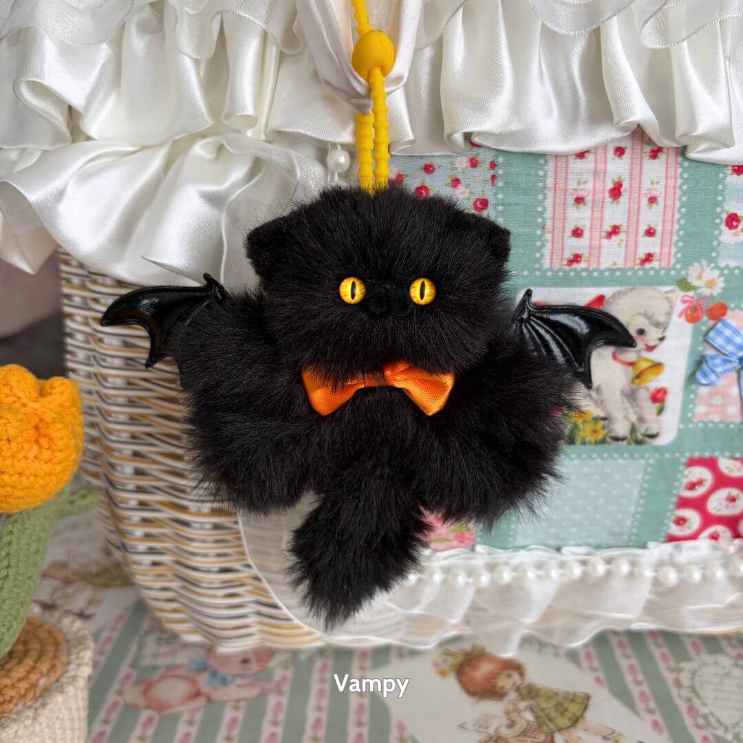 Handmade Winged Kitty Pendant, fluffy black cat with bat wings, orange bowtie, cute collectible, fantasy kitten decor.