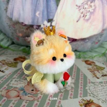 Adorable handmade puppy from the Cosplay Puppy Collection, featuring fluffy fur, a gold crown, and a rose accessory.