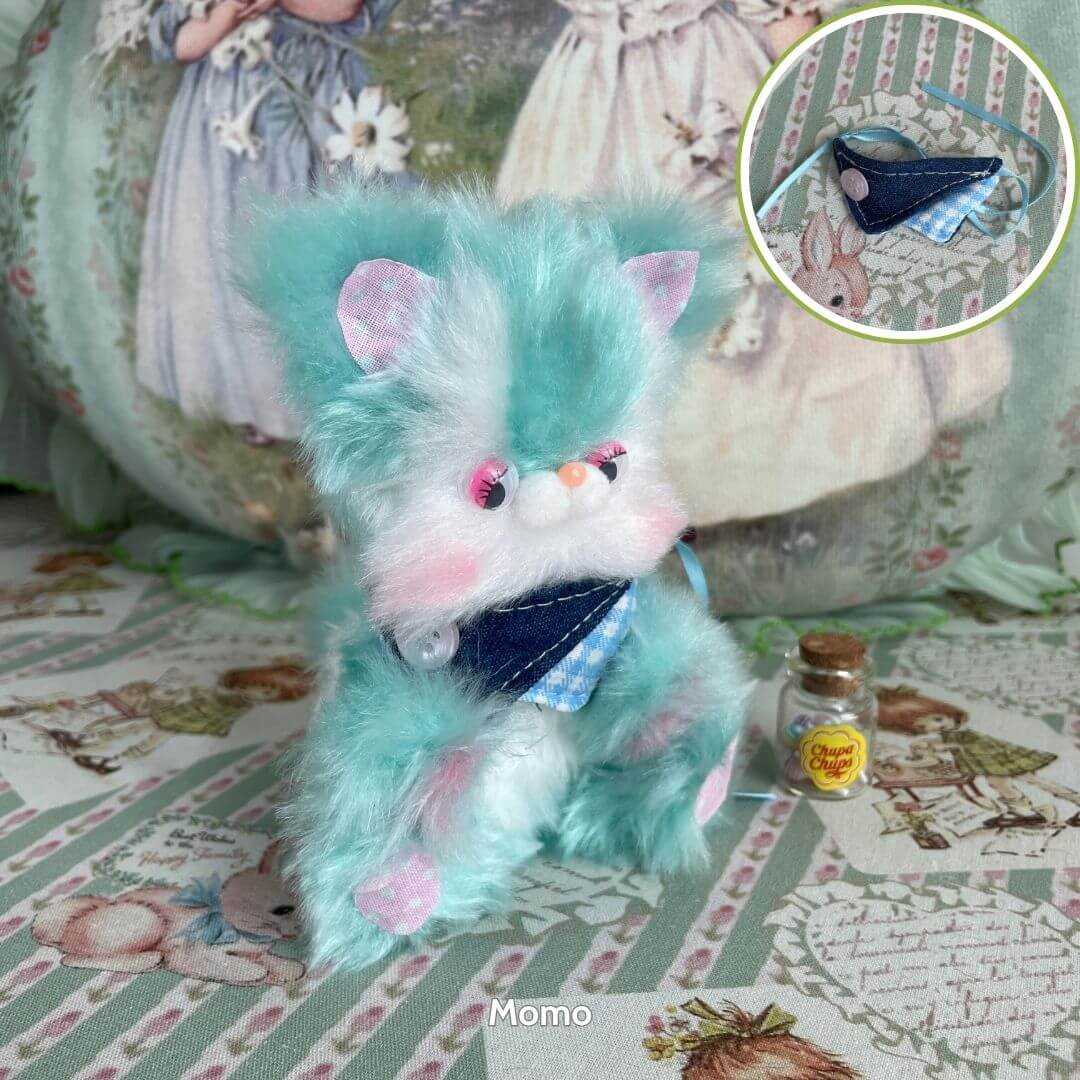 Retro Bunny Companions in pastel blue and pink fur, wearing a denim bandana, standing on a whimsical patterned surface.