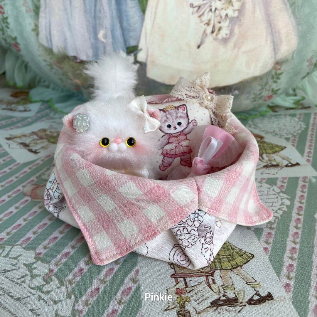 Gingham Cat Catch-All Tray featuring a fluffy kitten, pastel gingham fabric, and cute accessories in a whimsical setup.