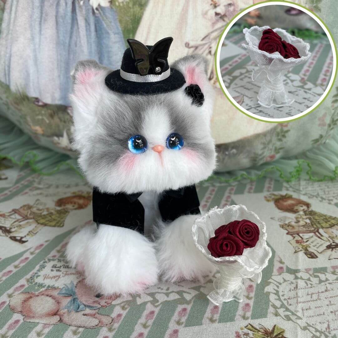 Enchanted Wedding of Mr. & Mrs. Paws: Fluffy gray and white miniature kitten in tuxedo holding a bouquet of red roses, kawaii cat collectible.