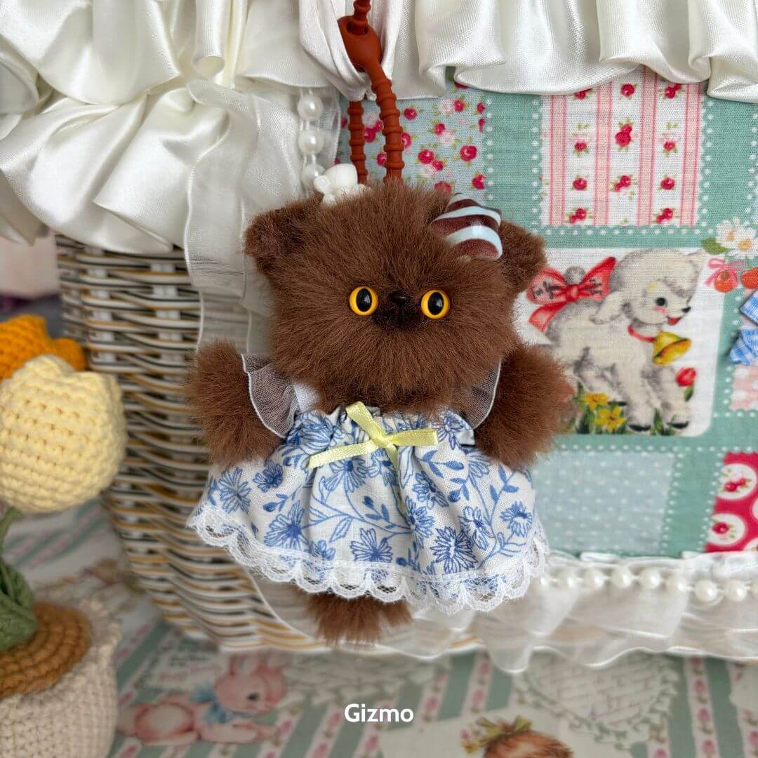 Pawsh Pendants: fuzzy brown kitten figurine in a blue floral dress, detailed design with cute accessories, handmade in UK collectible.