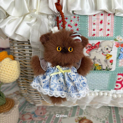 Pawsh Pendants: fuzzy brown kitten figurine in a blue floral dress, detailed design with cute accessories, handmade in UK collectible.